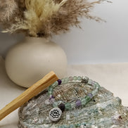 Bracelet Fluorite O'NAIA Palo Santo lithothérapie clarté mentale concentration harmonie chakra troisième œil
